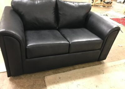 black leather 2 seater